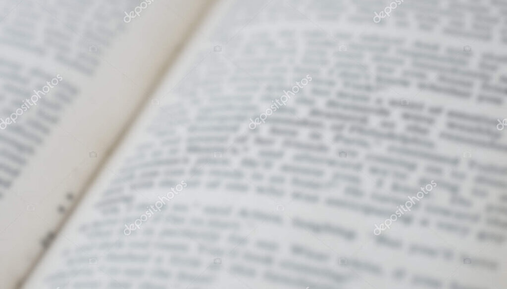 Book's pages blurred close-up